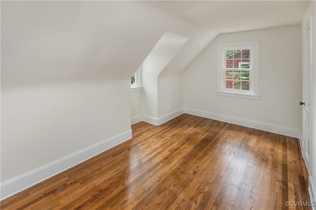 1217 Forest Ave, Henrico, VA 23229 - additional living space featuring vaulted ceiling and wood finished floors