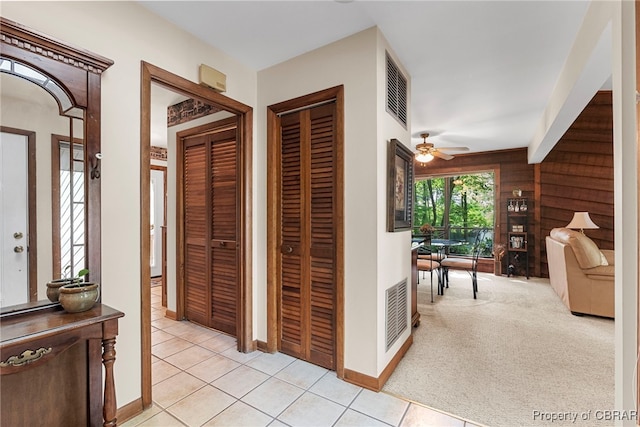 10000 Silverleaf Ter, Chesterfield, VA 23236 - hallway featuring wood walls and light tile patterned floors