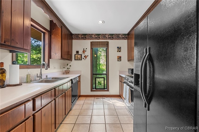 10000 Silverleaf Ter, Chesterfield, VA 23236 - kitchen featuring black appliances, light countertops, light tile patterned floors, and recessed lighting