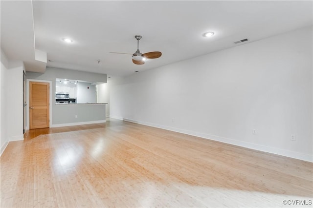 110 W Marshall St Unit U25, Richmond, VA 23220 - unfurnished living room featuring ceiling fan, light wood-style floors, and recessed lighting