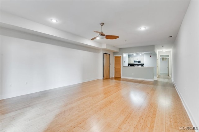 110 W Marshall St Unit U25, Richmond, VA 23220 - unfurnished living room with a ceiling fan, light wood-type flooring, and recessed lighting