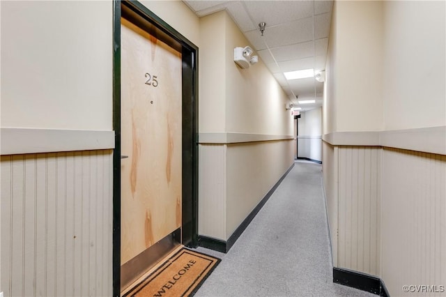 110 W Marshall St Unit U25, Richmond, VA 23220 - hallway featuring a drop ceiling and a wainscoted wall