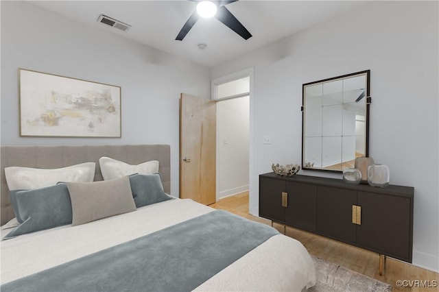 110 W Marshall St Unit U25, Richmond, VA 23220 - bedroom with wood finished floors and ceiling fan