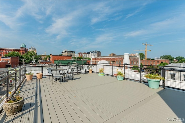110 W Marshall St Unit U25, Richmond, VA 23220 - deck with outdoor dining area and a city view