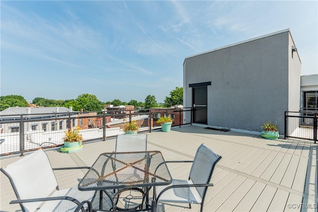 110 W Marshall St Unit U25, Richmond, VA 23220 - wooden deck featuring outdoor dining area