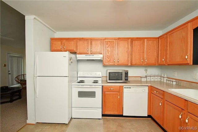 10106 Redbridge Rd, North Chesterfield, VA 23236 - kitchen with white appliances, under cabinet range hood, light countertops, and brown cabinets