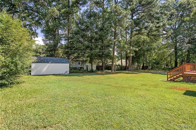 2803 Drewrys Bluff Rd, Chesterfield, VA 23237 - view of yard with a storage shed, stairway, a deck, and view of scattered trees
