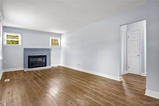 2803 Drewrys Bluff Rd, Chesterfield, VA 23237 - unfurnished living room with wood finished floors and a fireplace