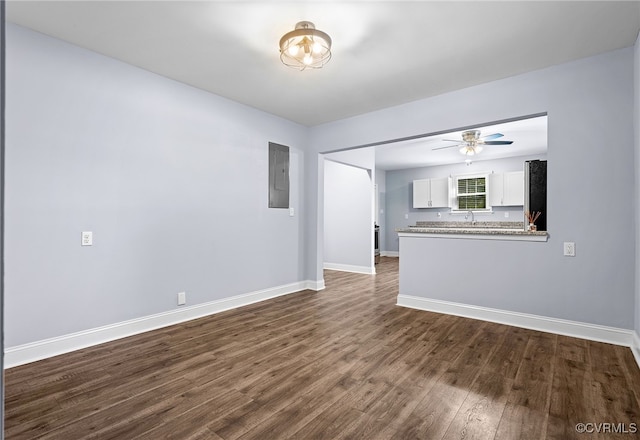 2803 Drewrys Bluff Rd, Chesterfield, VA 23237 - empty room with dark wood finished floors, electric panel, and a ceiling fan