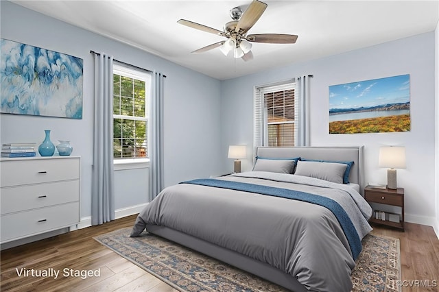 2803 Drewrys Bluff Rd, Chesterfield, VA 23237 - bedroom featuring wood finished floors, a water view, and ceiling fan