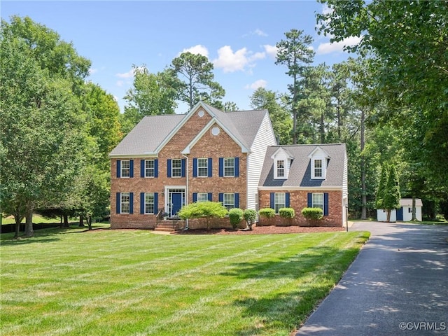 13625 Brandy Oaks Rd, Chesterfield, VA 23832 - view of front of property featuring brick siding and a front lawn