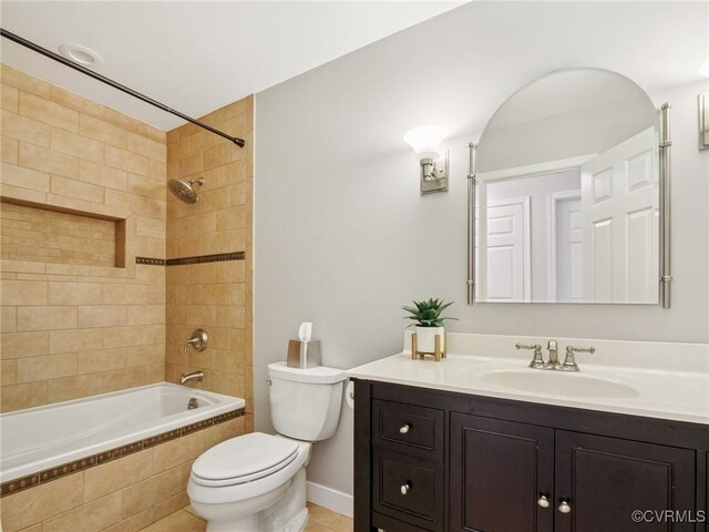 13625 Brandy Oaks Rd, Chesterfield, VA 23832 - full bathroom featuring vanity, tiled shower / bath combo, and tile patterned floors