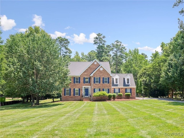 13625 Brandy Oaks Rd, Chesterfield, VA 23832 - view of front facade featuring brick siding and a front lawn