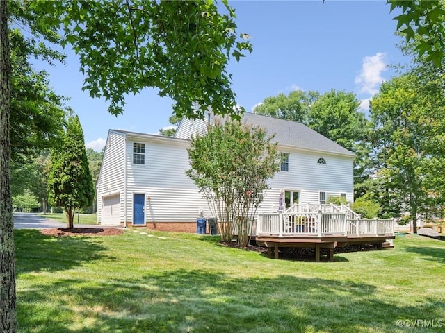 13625 Brandy Oaks Rd, Chesterfield, VA 23832 - rear view of property featuring a deck, a garage, and a yard