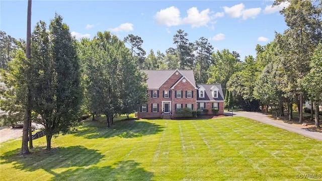 13625 Brandy Oaks Rd, Chesterfield, VA 23832 - colonial-style house with a front lawn and brick siding