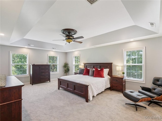 13625 Brandy Oaks Rd, Chesterfield, VA 23832 - bedroom featuring a tray ceiling, light carpet, multiple windows, a ceiling fan, and recessed lighting