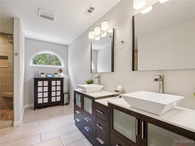 13625 Brandy Oaks Rd, Chesterfield, VA 23832 - bathroom with double vanity, a tile shower, and tile patterned floors