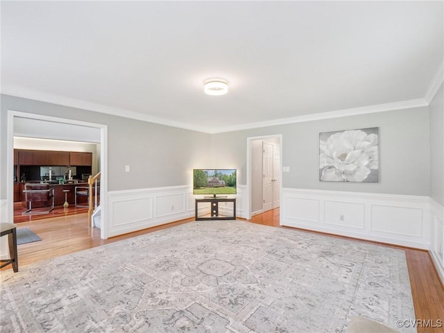 13625 Brandy Oaks Rd, Chesterfield, VA 23832 - spare room featuring crown molding, a wainscoted wall, and wood finished floors