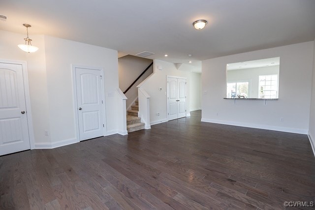 6419 Belay Dr, Chesterfield, VA 23234 - unfurnished living room featuring stairs, dark wood-style flooring, and recessed lighting