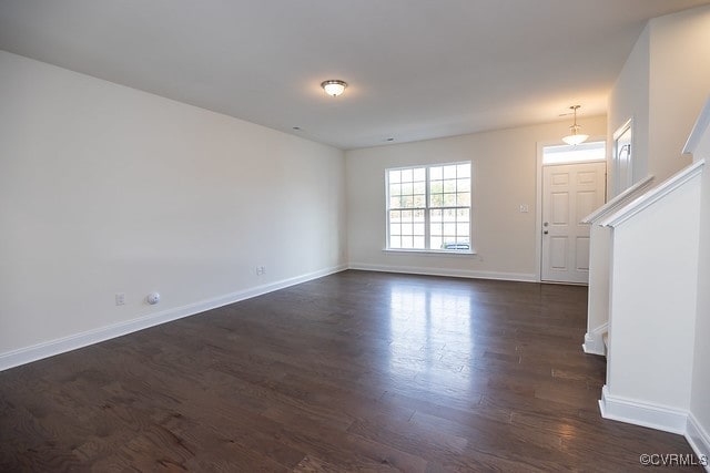 6407 Belay Dr, Chesterfield, VA 23234 - unfurnished living room with dark wood-style flooring and stairs