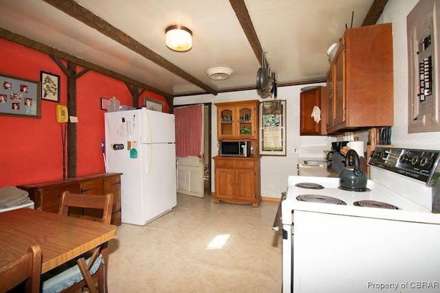 1026 Hoecake Rd, Lancaster, VA 22513 - kitchen with white appliances, beam ceiling, brown cabinets, light floors, and glass insert cabinets