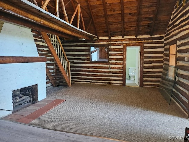 25122 S Tidewater Trl, Tappahannock, VA 22560 - unfurnished living room featuring a wood ceiling with exposed beams, a fireplace, high vaulted ceiling, and rustic walls