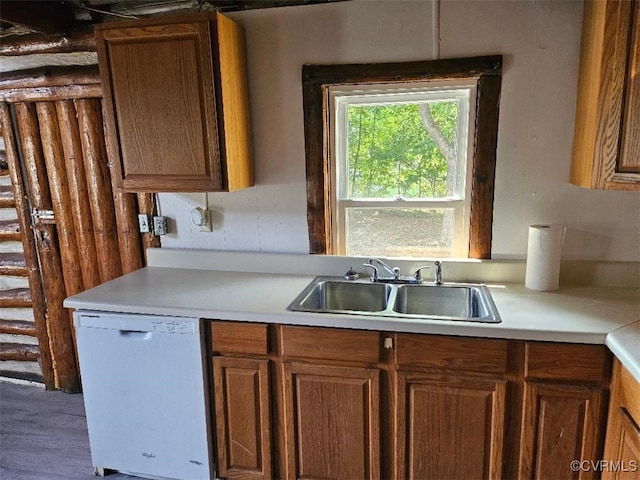 25122 S Tidewater Trl, Tappahannock, VA 22560 - kitchen featuring dishwasher, light countertops, brown cabinetry, and wood finished floors