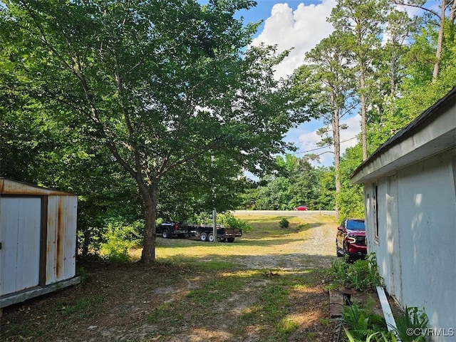 25122 S Tidewater Trl, Tappahannock, VA 22560 - view of yard featuring a storage unit