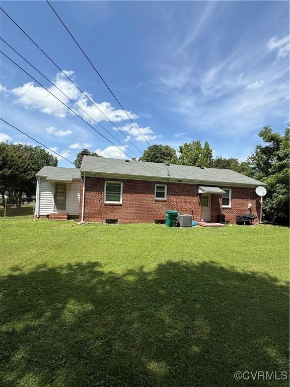 305 Danray Dr, Henrico, VA 23227 - back of property featuring a lawn and brick siding