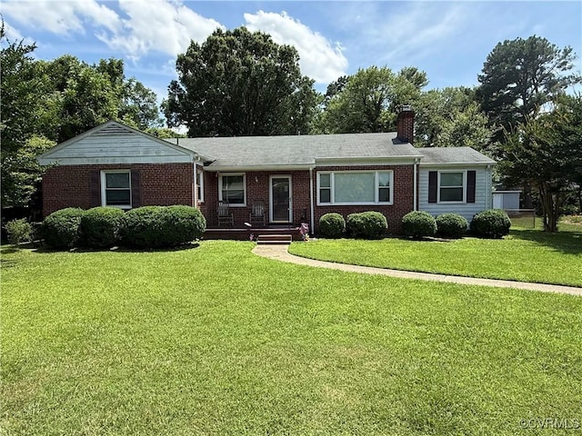 305 Danray Dr, Henrico, VA 23227 - single story home featuring a front yard, a chimney, and brick siding