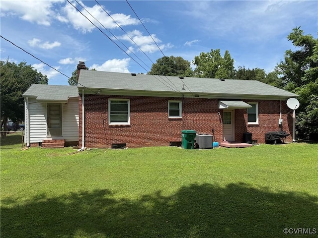 305 Danray Dr, Henrico, VA 23227 - back of property with a yard, a chimney, brick siding, and entry steps