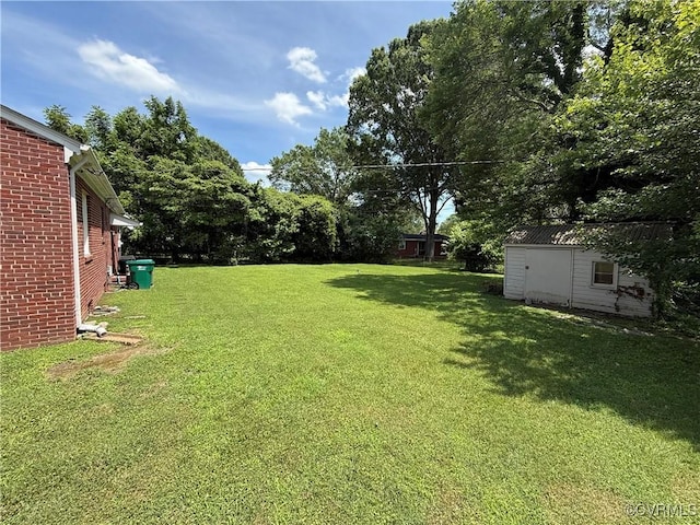 305 Danray Dr, Henrico, VA 23227 - view of grassy yard featuring a storage unit