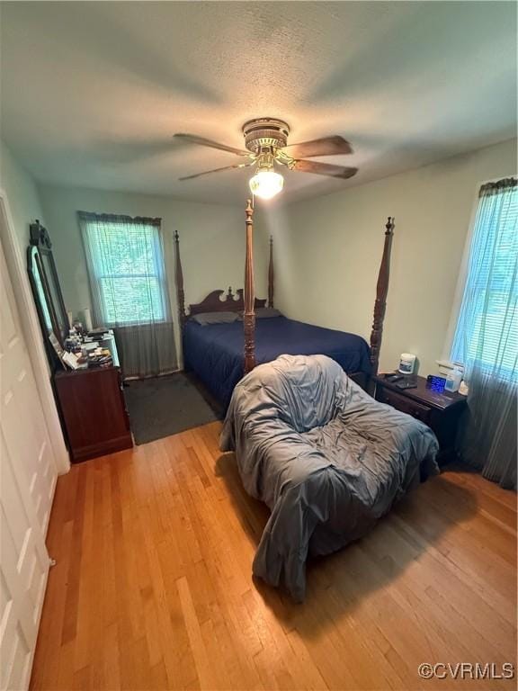 305 Danray Dr, Henrico, VA 23227 - bedroom featuring multiple windows, wood finished floors, and ceiling fan