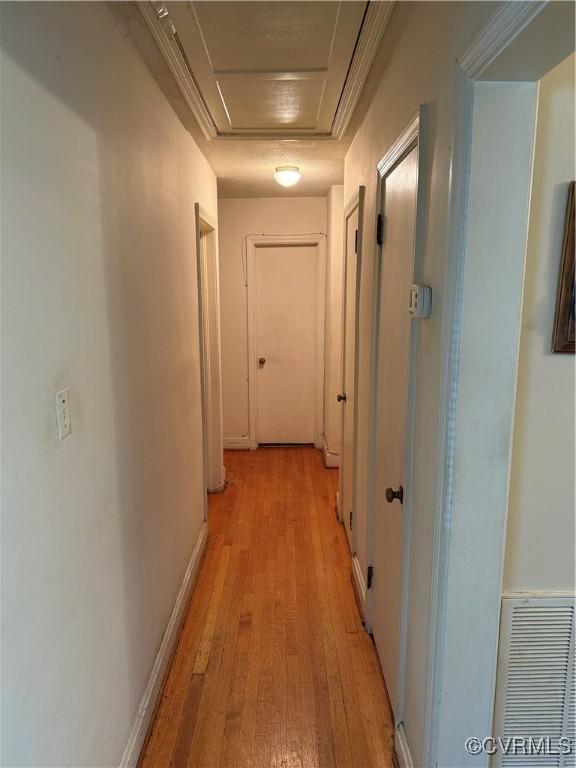 305 Danray Dr, Henrico, VA 23227 - hallway with light wood-type flooring and attic access