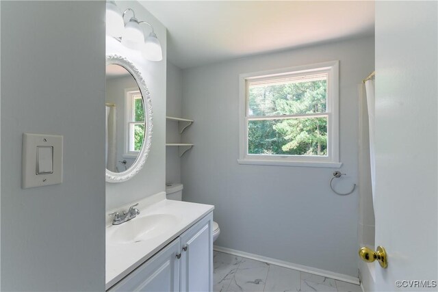 10002 Laurel Lakes Dr, Glen Allen, VA 23060 - full bathroom featuring vanity, healthy amount of natural light, marble look tile flooring, and a shower with curtain