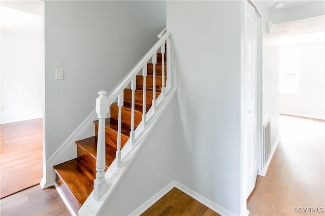 10002 Laurel Lakes Dr, Glen Allen, VA 23060 - stairway with wood finished floors