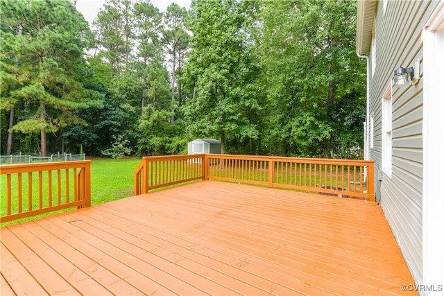 10002 Laurel Lakes Dr, Glen Allen, VA 23060 - deck featuring a storage shed, view of scattered trees, and a fenced backyard