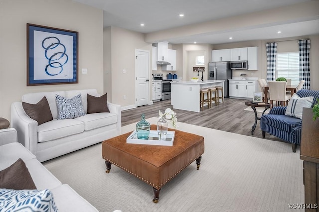 7201 Crosswinds Dr, North Chesterfield, VA 23234 - living area featuring light wood finished floors and recessed lighting