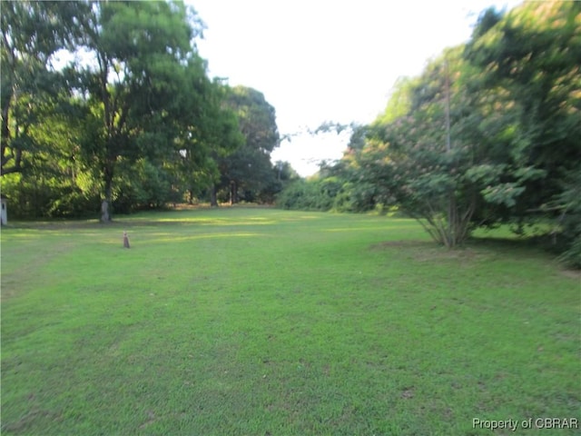 6847 Williams Landing Rd, Hayes, VA 23072 - view of green lawn with view of scattered trees