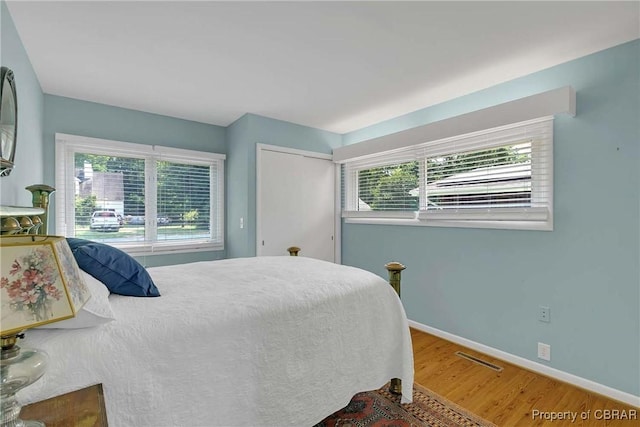 1583 Winona Park Dr, West Point, VA 23181 - bedroom with wood finished floors and baseboards