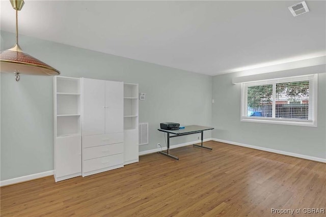 1583 Winona Park Dr, West Point, VA 23181 - unfurnished bedroom featuring wood finished floors