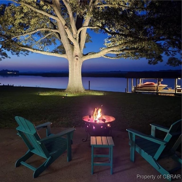 1583 Winona Park Dr, West Point, VA 23181 - view of patio featuring an outdoor fire pit and a water view