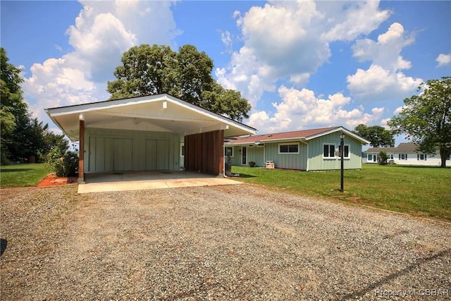 1583 Winona Park Dr, West Point, VA 23181 - ranch-style home featuring dirt driveway, board and batten siding, and a front yard