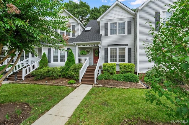 8015 Buford, North Chesterfield, VA 23235 - victorian-style house featuring a front lawn and roof with shingles