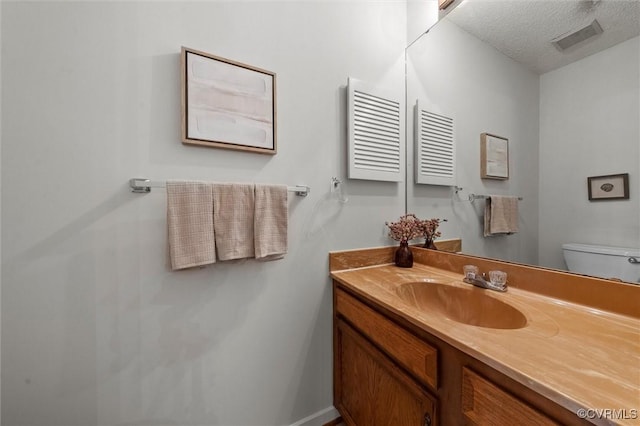 8015 Buford, North Chesterfield, VA 23235 - half bath with vanity and a textured ceiling