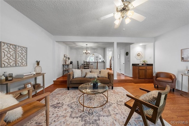 8015 Buford, North Chesterfield, VA 23235 - living area featuring a textured ceiling, a ceiling fan, wood finished floors, and a chandelier