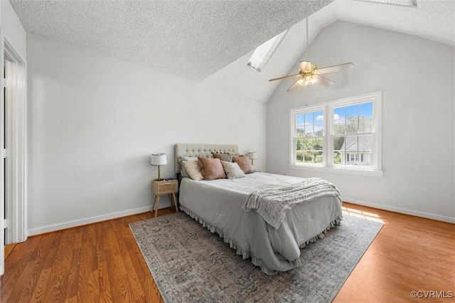 8015 Buford, North Chesterfield, VA 23235 - bedroom featuring a textured ceiling, a ceiling fan, wood finished floors, and high vaulted ceiling