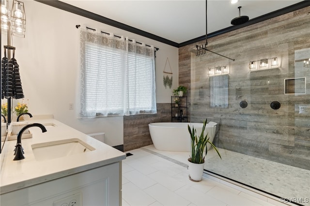 1 Cross County Rd, Mineral, VA 23117 - bathroom with tile walls, a freestanding bath, double vanity, tiled shower, and ornamental molding
