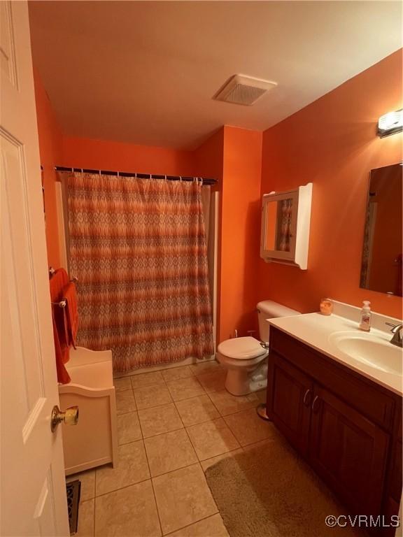 6197 Fishermans Way, Mechanicsville, VA 23116 - bathroom with vanity and tile patterned floors