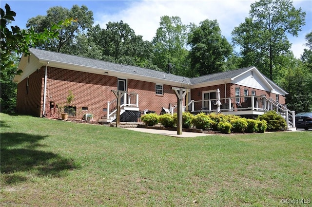 6197 Fishermans Way, Mechanicsville, VA 23116 - rear view of property with brick siding, a yard, and stairway